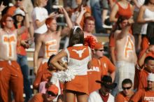 The University of Texas football team defeated the Arkansas Razorbacks with a score of 52-10 in Austin, TX on Saturday, September 27, 2008.

Filename: SRM_20080927_17151433.jpg
Aperture: f/5.6
Shutter Speed: 1/2500
Body: Canon EOS-1D Mark II
Lens: Canon EF 300mm f/2.8 L IS