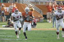 The University of Texas football team defeated the Arkansas Razorbacks with a score of 52-10 in Austin, TX on Saturday, September 27, 2008.

Filename: SRM_20080927_17161879.jpg
Aperture: f/5.6
Shutter Speed: 1/640
Body: Canon EOS-1D Mark II
Lens: Canon EF 300mm f/2.8 L IS