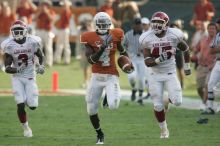 The University of Texas football team defeated the Arkansas Razorbacks with a score of 52-10 in Austin, TX on Saturday, September 27, 2008.

Filename: SRM_20080927_17162083.jpg
Aperture: f/5.6
Shutter Speed: 1/800
Body: Canon EOS-1D Mark II
Lens: Canon EF 300mm f/2.8 L IS