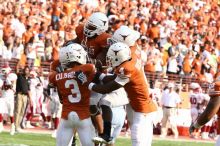 The University of Texas football team defeated the Arkansas Razorbacks with a score of 52-10 in Austin, TX on Saturday, September 27, 2008.

Filename: SRM_20080927_17164418.jpg
Aperture: f/5.6
Shutter Speed: 1/800
Body: Canon EOS 20D
Lens: Canon EF 80-200mm f/2.8 L