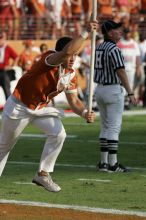 Texas Cheerleaders.  The University of Texas football team defeated the Arkansas Razorbacks with a score of 52-10 in Austin, TX on Saturday, September 27, 2008.

Filename: SRM_20080927_17182002.jpg
Aperture: f/5.6
Shutter Speed: 1/2000
Body: Canon EOS-1D Mark II
Lens: Canon EF 300mm f/2.8 L IS