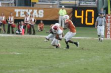 The University of Texas football team defeated the Arkansas Razorbacks with a score of 52-10 in Austin, TX on Saturday, September 27, 2008.

Filename: SRM_20080927_17253874.jpg
Aperture: f/5.0
Shutter Speed: 1/640
Body: Canon EOS-1D Mark II
Lens: Canon EF 300mm f/2.8 L IS