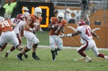 The University of Texas football team defeated the Arkansas Razorbacks with a score of 52-10 in Austin, TX on Saturday, September 27, 2008.

Filename: SRM_20080927_17295693.jpg
Aperture: f/5.6
Shutter Speed: 1/640
Body: Canon EOS-1D Mark II
Lens: Canon EF 300mm f/2.8 L IS