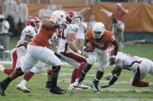 The University of Texas football team defeated the Arkansas Razorbacks with a score of 52-10 in Austin, TX on Saturday, September 27, 2008.

Filename: SRM_20080927_17310619.jpg
Aperture: f/5.6
Shutter Speed: 1/500
Body: Canon EOS-1D Mark II
Lens: Canon EF 300mm f/2.8 L IS