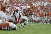 The University of Texas football team defeated the Arkansas Razorbacks with a score of 52-10 in Austin, TX on Saturday, September 27, 2008.

Filename: SRM_20080927_17342851.jpg
Aperture: f/5.0
Shutter Speed: 1/1000
Body: Canon EOS-1D Mark II
Lens: Canon EF 300mm f/2.8 L IS