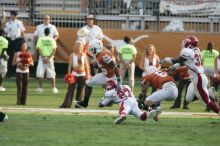 The University of Texas football team defeated the Arkansas Razorbacks with a score of 52-10 in Austin, TX on Saturday, September 27, 2008.

Filename: SRM_20080927_17412814.jpg
Aperture: f/5.6
Shutter Speed: 1/800
Body: Canon EOS-1D Mark II
Lens: Canon EF 300mm f/2.8 L IS