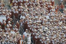 The University of Texas football team defeated the Arkansas Razorbacks with a score of 52-10 in Austin, TX on Saturday, September 27, 2008.

Filename: SRM_20080927_17423422.jpg
Aperture: f/5.6
Shutter Speed: 1/1000
Body: Canon EOS-1D Mark II
Lens: Canon EF 300mm f/2.8 L IS