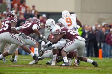 The University of Texas, Austin played Texas A&M in football at Kyle Field, College Station, on November 23, 2007.  UT lost to the Aggies, 30 to 38.

Filename: SRM_20071123_1554228.jpg
Aperture: f/5.6
Shutter Speed: 1/500
Body: Canon EOS-1D Mark II
Lens: Canon EF 300mm f/2.8 L IS