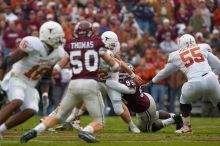 The University of Texas, Austin played Texas A&M in football at Kyle Field, College Station, on November 23, 2007.  UT lost to the Aggies, 30 to 38.

Filename: SRM_20071123_1555027.jpg
Aperture: f/5.6
Shutter Speed: 1/800
Body: Canon EOS-1D Mark II
Lens: Canon EF 300mm f/2.8 L IS