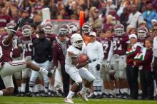 The University of Texas, Austin played Texas A&M in football at Kyle Field, College Station, on November 23, 2007.  UT lost to the Aggies, 30 to 38.

Filename: SRM_20071123_1602183.jpg
Aperture: f/5.6
Shutter Speed: 1/640
Body: Canon EOS-1D Mark II
Lens: Canon EF 300mm f/2.8 L IS