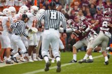 The University of Texas, Austin played Texas A&M in football at Kyle Field, College Station, on November 23, 2007.  UT lost to the Aggies, 30 to 38.

Filename: SRM_20071123_1626568.jpg
Aperture: f/5.6
Shutter Speed: 1/500
Body: Canon EOS-1D Mark II
Lens: Canon EF 300mm f/2.8 L IS