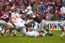 The University of Texas, Austin played Texas A&M in football at Kyle Field, College Station, on November 23, 2007.  UT lost to the Aggies, 30 to 38.

Filename: SRM_20071123_1627140.jpg
Aperture: f/5.6
Shutter Speed: 1/500
Body: Canon EOS-1D Mark II
Lens: Canon EF 300mm f/2.8 L IS