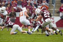 The University of Texas, Austin played Texas A&M in football at Kyle Field, College Station, on November 23, 2007.  UT lost to the Aggies, 30 to 38.

Filename: SRM_20071123_1632301.jpg
Aperture: f/5.6
Shutter Speed: 1/640
Body: Canon EOS-1D Mark II
Lens: Canon EF 300mm f/2.8 L IS