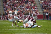 The University of Texas, Austin played Texas A&M in football at Kyle Field, College Station, on November 23, 2007.  UT lost to the Aggies, 30 to 38.

Filename: SRM_20071123_1655206.jpg
Aperture: f/2.8
Shutter Speed: 1/1250
Body: Canon EOS-1D Mark II
Lens: Canon EF 300mm f/2.8 L IS