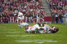 The University of Texas, Austin played Texas A&M in football at Kyle Field, College Station, on November 23, 2007.  UT lost to the Aggies, 30 to 38.

Filename: SRM_20071123_1655228.jpg
Aperture: f/2.8
Shutter Speed: 1/1250
Body: Canon EOS-1D Mark II
Lens: Canon EF 300mm f/2.8 L IS