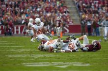 The University of Texas, Austin played Texas A&M in football at Kyle Field, College Station, on November 23, 2007.  UT lost to the Aggies, 30 to 38.

Filename: SRM_20071123_1655249.jpg
Aperture: f/2.8
Shutter Speed: 1/1250
Body: Canon EOS-1D Mark II
Lens: Canon EF 300mm f/2.8 L IS