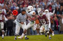 The University of Texas, Austin played Texas A&M in football at Kyle Field, College Station, on November 23, 2007.  UT lost to the Aggies, 30 to 38.

Filename: SRM_20071123_1755002.jpg
Aperture: f/2.8
Shutter Speed: 1/640
Body: Canon EOS-1D Mark II
Lens: Canon EF 300mm f/2.8 L IS