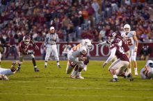 The University of Texas, Austin played Texas A&M in football at Kyle Field, College Station, on November 23, 2007.  UT lost to the Aggies, 30 to 38.

Filename: SRM_20071123_1811022.jpg
Aperture: f/2.8
Shutter Speed: 1/500
Body: Canon EOS-1D Mark II
Lens: Canon EF 300mm f/2.8 L IS