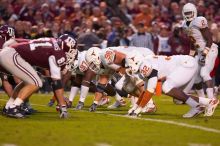 The University of Texas, Austin played Texas A&M in football at Kyle Field, College Station, on November 23, 2007.  UT lost to the Aggies, 30 to 38.

Filename: SRM_20071123_1816365.jpg
Aperture: f/2.8
Shutter Speed: 1/500
Body: Canon EOS-1D Mark II
Lens: Canon EF 300mm f/2.8 L IS