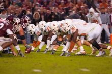 The University of Texas, Austin played Texas A&M in football at Kyle Field, College Station, on November 23, 2007.  UT lost to the Aggies, 30 to 38.

Filename: SRM_20071123_1817167.jpg
Aperture: f/2.8
Shutter Speed: 1/500
Body: Canon EOS-1D Mark II
Lens: Canon EF 300mm f/2.8 L IS