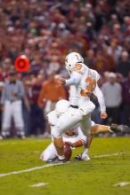 The University of Texas, Austin played Texas A&M in football at Kyle Field, College Station, on November 23, 2007.  UT lost to the Aggies, 30 to 38.

Filename: SRM_20071123_1822340.jpg
Aperture: f/2.8
Shutter Speed: 1/500
Body: Canon EOS-1D Mark II
Lens: Canon EF 300mm f/2.8 L IS