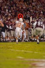 The University of Texas, Austin played Texas A&M in football at Kyle Field, College Station, on November 23, 2007.  UT lost to the Aggies, 30 to 38.

Filename: SRM_20071123_1834004.jpg
Aperture: f/2.8
Shutter Speed: 1/500
Body: Canon EOS-1D Mark II
Lens: Canon EF 300mm f/2.8 L IS