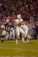 The University of Texas, Austin played Texas A&M in football at Kyle Field, College Station, on November 23, 2007.  UT lost to the Aggies, 30 to 38.

Filename: SRM_20071123_1909122.jpg
Aperture: f/2.8
Shutter Speed: 1/500
Body: Canon EOS-1D Mark II
Lens: Canon EF 300mm f/2.8 L IS