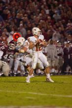 The University of Texas, Austin played Texas A&M in football at Kyle Field, College Station, on November 23, 2007.  UT lost to the Aggies, 30 to 38.

Filename: SRM_20071123_1909123.jpg
Aperture: f/2.8
Shutter Speed: 1/500
Body: Canon EOS-1D Mark II
Lens: Canon EF 300mm f/2.8 L IS