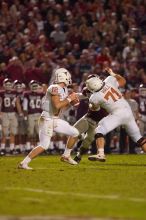 The University of Texas, Austin played Texas A&M in football at Kyle Field, College Station, on November 23, 2007.  UT lost to the Aggies, 30 to 38.

Filename: SRM_20071123_1909487.jpg
Aperture: f/2.8
Shutter Speed: 1/500
Body: Canon EOS-1D Mark II
Lens: Canon EF 300mm f/2.8 L IS