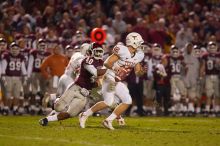 The University of Texas, Austin played Texas A&M in football at Kyle Field, College Station, on November 23, 2007.  UT lost to the Aggies, 30 to 38.

Filename: SRM_20071123_1911044.jpg
Aperture: f/2.8
Shutter Speed: 1/500
Body: Canon EOS-1D Mark II
Lens: Canon EF 300mm f/2.8 L IS