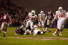 The University of Texas, Austin played Texas A&M in football at Kyle Field, College Station, on November 23, 2007.  UT lost to the Aggies, 30 to 38.

Filename: SRM_20071123_1912187.jpg
Aperture: f/2.8
Shutter Speed: 1/500
Body: Canon EOS-1D Mark II
Lens: Canon EF 300mm f/2.8 L IS