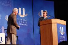 Former President Bill Clinton welcomes UT President William Powers Jr. to the stage.  Day one of the 2nd Annual Clinton Global Initiative University (CGIU) meeting was held at The University of Texas at Austin, Friday, February 13, 2009.

Filename: SRM_20090213_16293946.jpg
Aperture: f/4.0
Shutter Speed: 1/125
Body: Canon EOS-1D Mark II
Lens: Canon EF 80-200mm f/2.8 L