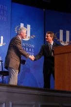 Former President Bill Clinton shakes hands with UT President William Powers Jr. after he spoke at the opening plenary session of the CGIU meeting.  Day one of the 2nd Annual Clinton Global Initiative University (CGIU) meeting was held at The University of Texas at Austin, Friday, February 13, 2009.

Filename: SRM_20090213_16354103.jpg
Aperture: f/4.0
Shutter Speed: 1/160
Body: Canon EOS-1D Mark II
Lens: Canon EF 80-200mm f/2.8 L