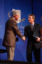 Former President Bill Clinton shakes hands with UT President William Powers Jr. after he spoke at the opening plenary session of the CGIU meeting.  Day one of the 2nd Annual Clinton Global Initiative University (CGIU) meeting was held at The University of Texas at Austin, Friday, February 13, 2009.

Filename: SRM_20090213_16354210.jpg
Aperture: f/4.0
Shutter Speed: 1/160
Body: Canon EOS-1D Mark II
Lens: Canon EF 80-200mm f/2.8 L