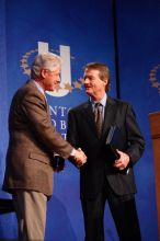 Former President Bill Clinton shakes hands with UT President William Powers Jr. after he spoke at the opening plenary session of the CGIU meeting.  Day one of the 2nd Annual Clinton Global Initiative University (CGIU) meeting was held at The University of Texas at Austin, Friday, February 13, 2009.

Filename: SRM_20090213_16354211.jpg
Aperture: f/4.0
Shutter Speed: 1/125
Body: Canon EOS-1D Mark II
Lens: Canon EF 80-200mm f/2.8 L