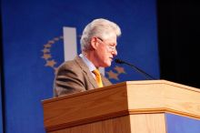 Former President Bill Clinton hands out commitment certificates to CGIU attendees for their exceptional pledges to the CGI cause during the opening plenary session of the CGIU meeting.  Day one of the 2nd Annual Clinton Global Initiative University (CGIU) meeting was held at The University of Texas at Austin, Friday, February 13, 2009.

Filename: SRM_20090213_16361716.jpg
Aperture: f/4.0
Shutter Speed: 1/100
Body: Canon EOS-1D Mark II
Lens: Canon EF 80-200mm f/2.8 L