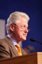 Former President Bill Clinton hands out commitment certificates to CGIU attendees for their exceptional pledges to the CGI cause during the opening plenary session of the CGIU meeting.  Day one of the 2nd Annual Clinton Global Initiative University (CGIU) meeting was held at The University of Texas at Austin, Friday, February 13, 2009.

Filename: SRM_20090213_16363661.jpg
Aperture: f/2.8
Shutter Speed: 1/200
Body: Canon EOS 20D
Lens: Canon EF 300mm f/2.8 L IS