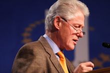 Former President Bill Clinton hands out commitment certificates to CGIU attendees for their exceptional pledges to the CGI cause during the opening plenary session of the CGIU meeting.  Day one of the 2nd Annual Clinton Global Initiative University (CGIU) meeting was held at The University of Texas at Austin, Friday, February 13, 2009.

Filename: SRM_20090213_16364663.jpg
Aperture: f/2.8
Shutter Speed: 1/200
Body: Canon EOS 20D
Lens: Canon EF 300mm f/2.8 L IS