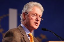 Former President Bill Clinton hands out commitment certificates to CGIU attendees for their exceptional pledges to the CGI cause during the opening plenary session of the CGIU meeting.  Day one of the 2nd Annual Clinton Global Initiative University (CGIU) meeting was held at The University of Texas at Austin, Friday, February 13, 2009.

Filename: SRM_20090213_16365866.jpg
Aperture: f/2.8
Shutter Speed: 1/200
Body: Canon EOS 20D
Lens: Canon EF 300mm f/2.8 L IS