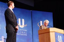 Former President Bill Clinton hands out commitment certificates to CGIU attendees for their exceptional pledges to the CGI cause during the opening plenary session of the CGIU meeting.  Day one of the 2nd Annual Clinton Global Initiative University (CGIU) meeting was held at The University of Texas at Austin, Friday, February 13, 2009.

Filename: SRM_20090213_16372918.jpg
Aperture: f/4.0
Shutter Speed: 1/80
Body: Canon EOS-1D Mark II
Lens: Canon EF 80-200mm f/2.8 L