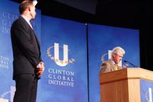 Former President Bill Clinton hands out commitment certificates to CGIU attendees for their exceptional pledges to the CGI cause during the opening plenary session of the CGIU meeting.  Day one of the 2nd Annual Clinton Global Initiative University (CGIU) meeting was held at The University of Texas at Austin, Friday, February 13, 2009.

Filename: SRM_20090213_16384426.jpg
Aperture: f/4.0
Shutter Speed: 1/100
Body: Canon EOS-1D Mark II
Lens: Canon EF 80-200mm f/2.8 L