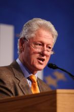 Former President Bill Clinton hands out commitment certificates to CGIU attendees for their exceptional pledges to the CGI cause during the opening plenary session of the CGIU meeting.  Day one of the 2nd Annual Clinton Global Initiative University (CGIU) meeting was held at The University of Texas at Austin, Friday, February 13, 2009.

Filename: SRM_20090213_16393473.jpg
Aperture: f/2.8
Shutter Speed: 1/320
Body: Canon EOS 20D
Lens: Canon EF 300mm f/2.8 L IS
