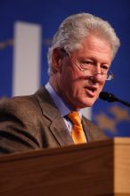 Former President Bill Clinton hands out commitment certificates to CGIU attendees for their exceptional pledges to the CGI cause during the opening plenary session of the CGIU meeting.  Day one of the 2nd Annual Clinton Global Initiative University (CGIU) meeting was held at The University of Texas at Austin, Friday, February 13, 2009.

Filename: SRM_20090213_16393774.jpg
Aperture: f/2.8
Shutter Speed: 1/320
Body: Canon EOS 20D
Lens: Canon EF 300mm f/2.8 L IS