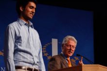 Former President Bill Clinton hands out commitment certificates to CGIU attendees for their exceptional pledges to the CGI cause during the opening plenary session of the CGIU meeting.  Day one of the 2nd Annual Clinton Global Initiative University (CGIU) meeting was held at The University of Texas at Austin, Friday, February 13, 2009.

Filename: SRM_20090213_16423670.jpg
Aperture: f/4.0
Shutter Speed: 1/200
Body: Canon EOS-1D Mark II
Lens: Canon EF 80-200mm f/2.8 L