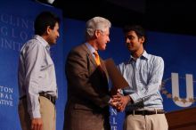Former President Bill Clinton hands out commitment certificates to CGIU attendees for their exceptional pledges to the CGI cause during the opening plenary session of the CGIU meeting.  Day one of the 2nd Annual Clinton Global Initiative University (CGIU) meeting was held at The University of Texas at Austin, Friday, February 13, 2009.

Filename: SRM_20090213_16425280.jpg
Aperture: f/4.0
Shutter Speed: 1/200
Body: Canon EOS-1D Mark II
Lens: Canon EF 80-200mm f/2.8 L
