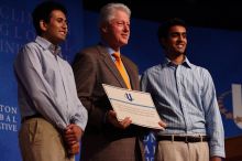 Former President Bill Clinton hands out commitment certificates to CGIU attendees for their exceptional pledges to the CGI cause during the opening plenary session of the CGIU meeting.  Day one of the 2nd Annual Clinton Global Initiative University (CGIU) meeting was held at The University of Texas at Austin, Friday, February 13, 2009.

Filename: SRM_20090213_16425585.jpg
Aperture: f/4.0
Shutter Speed: 1/250
Body: Canon EOS-1D Mark II
Lens: Canon EF 80-200mm f/2.8 L
