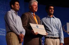 Former President Bill Clinton hands out commitment certificates to CGIU attendees for their exceptional pledges to the CGI cause during the opening plenary session of the CGIU meeting.  Day one of the 2nd Annual Clinton Global Initiative University (CGIU) meeting was held at The University of Texas at Austin, Friday, February 13, 2009.

Filename: SRM_20090213_16425586.jpg
Aperture: f/4.0
Shutter Speed: 1/250
Body: Canon EOS-1D Mark II
Lens: Canon EF 80-200mm f/2.8 L