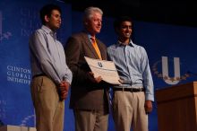 Former President Bill Clinton hands out commitment certificates to CGIU attendees for their exceptional pledges to the CGI cause during the opening plenary session of the CGIU meeting.  Day one of the 2nd Annual Clinton Global Initiative University (CGIU) meeting was held at The University of Texas at Austin, Friday, February 13, 2009.

Filename: SRM_20090213_16425787.jpg
Aperture: f/4.0
Shutter Speed: 1/320
Body: Canon EOS-1D Mark II
Lens: Canon EF 80-200mm f/2.8 L