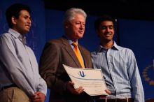 Former President Bill Clinton hands out commitment certificates to CGIU attendees for their exceptional pledges to the CGI cause during the opening plenary session of the CGIU meeting.  Day one of the 2nd Annual Clinton Global Initiative University (CGIU) meeting was held at The University of Texas at Austin, Friday, February 13, 2009.

Filename: SRM_20090213_16430089.jpg
Aperture: f/4.0
Shutter Speed: 1/250
Body: Canon EOS-1D Mark II
Lens: Canon EF 80-200mm f/2.8 L