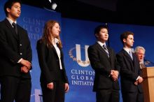 Former President Bill Clinton hands out commitment certificates to CGIU attendees for their exceptional pledges to the CGI cause during the opening plenary session of the CGIU meeting.  Day one of the 2nd Annual Clinton Global Initiative University (CGIU) meeting was held at The University of Texas at Austin, Friday, February 13, 2009.

Filename: SRM_20090213_16453412.jpg
Aperture: f/4.0
Shutter Speed: 1/125
Body: Canon EOS-1D Mark II
Lens: Canon EF 80-200mm f/2.8 L